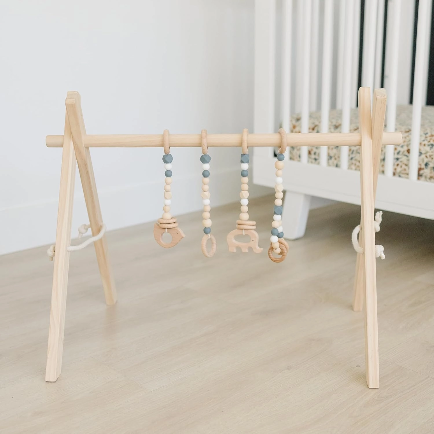 Poppyseed Play - Wooden Baby Play Gym, Montessori Activity Center w/Hanging Beech Wood Toys, Foldable Natural Pine Wood Frame, Portable Infant Play Gym, Motor Skill Development & Modern Nursery Decor